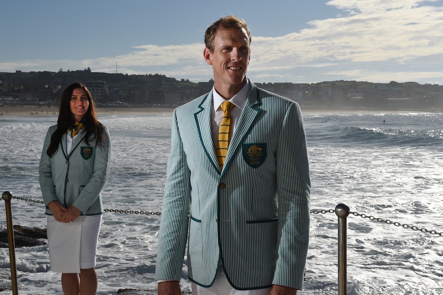 Charlotte Caslick (L), Ken Wallace wear Australia's Olympic team Opening Ceremony uniforms for Rio.