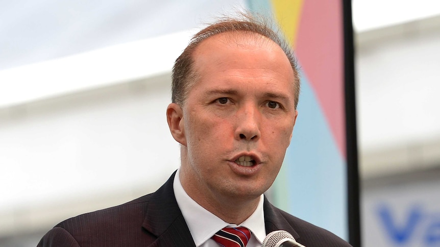 Federal minister Peter Dutton talks.