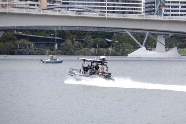 Water police are scouring the Brisbane River.