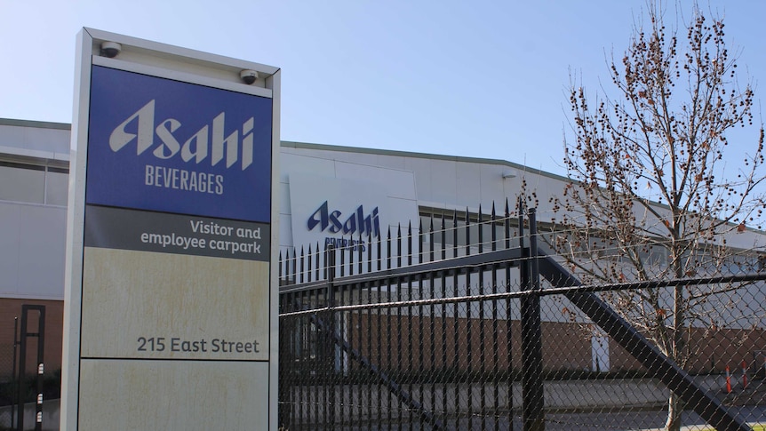 The Albury Asahi factory sign with barbed wire behind it
