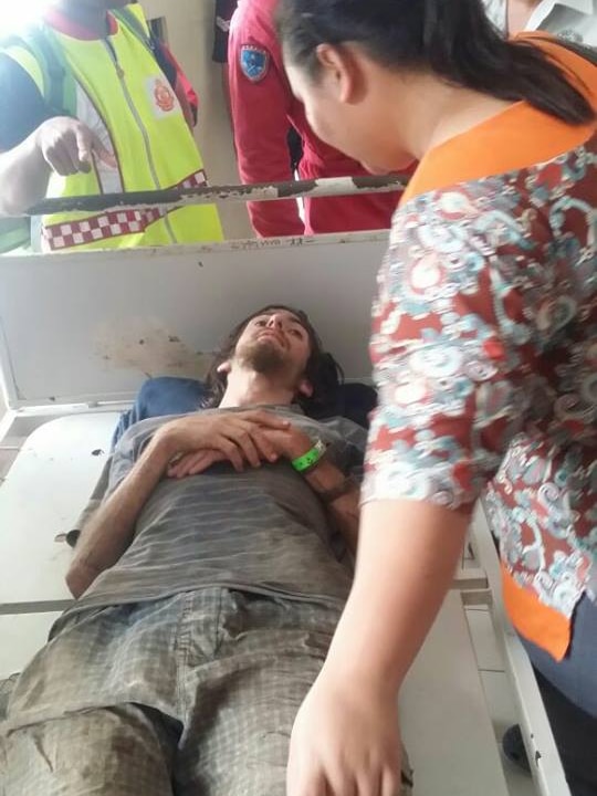 Andrew Gaskell being attended to after his rescue in Malaysia.