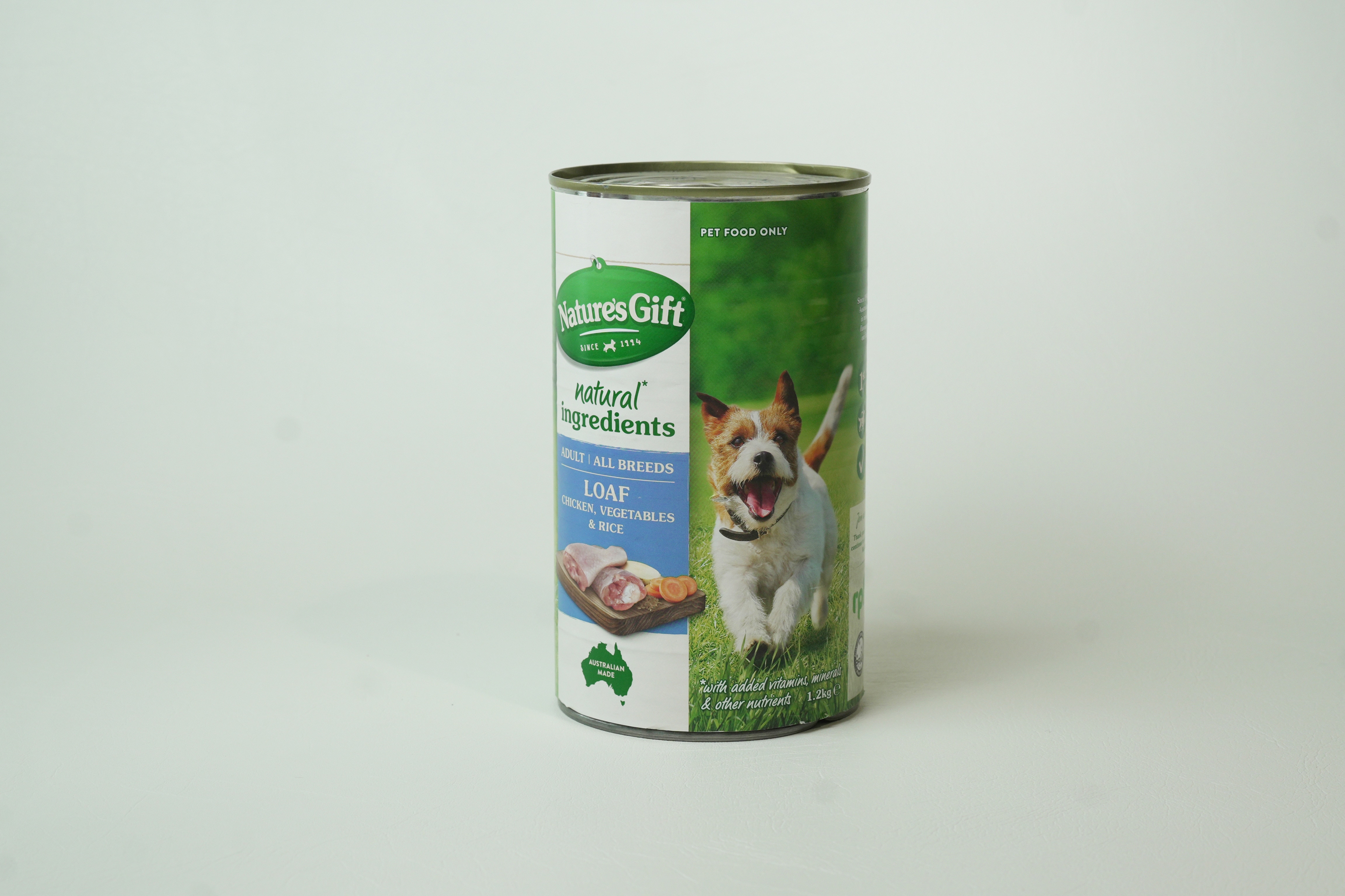 A can of Nature's Gift dog food on a white background.