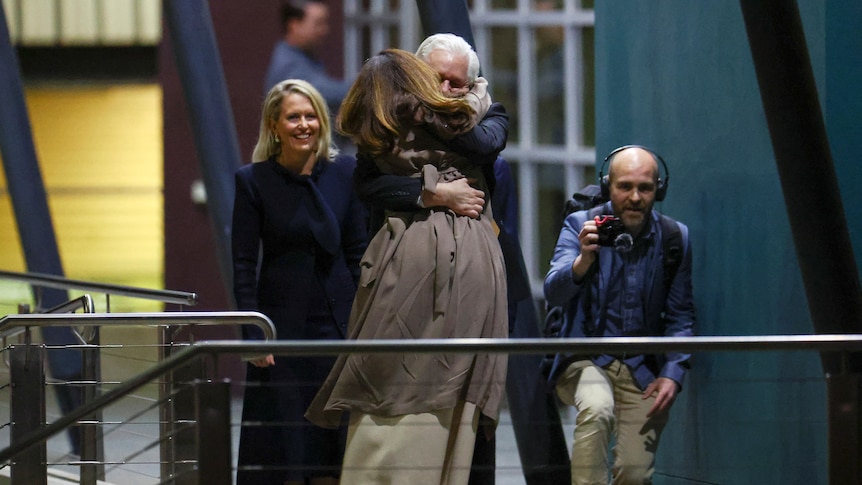Julian Assange meets wife Stella at airport