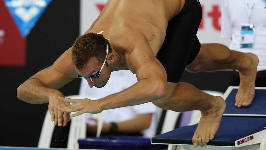 Thorpe dives into the pool in Singapore