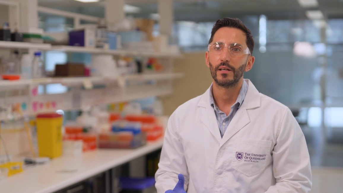 andres gambini from uq in a white lab coat