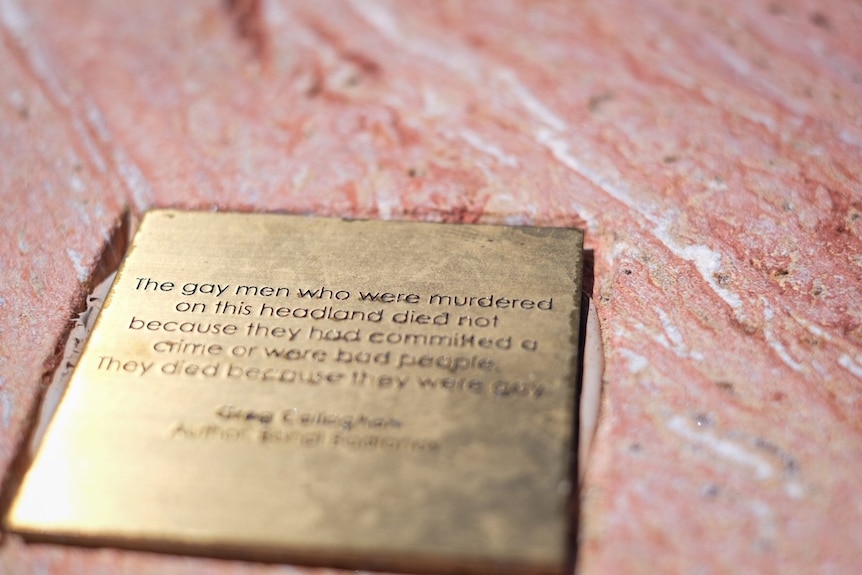 a plaque at a memorial site