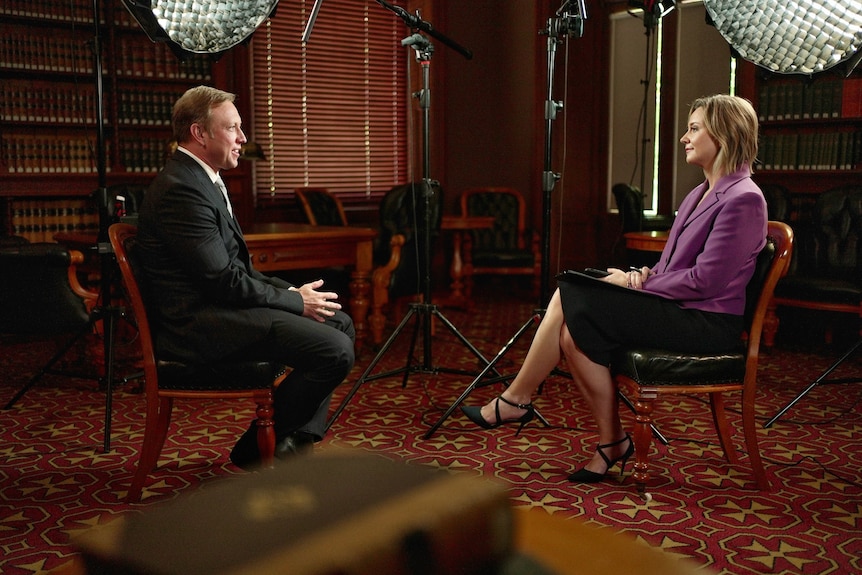 Premier Steven Miles sits across from ABC presenter Jessica van Vonderen in an interview