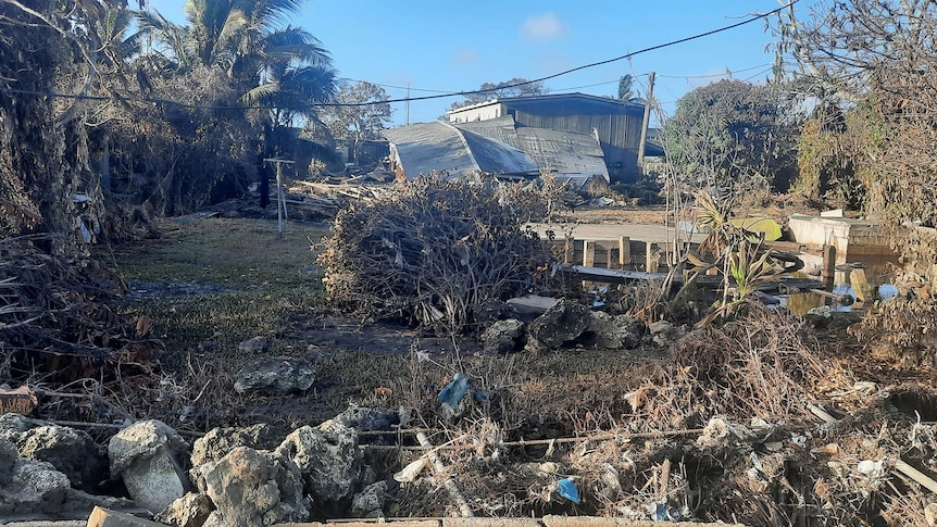 Damaged buildings and debris after a tsunami