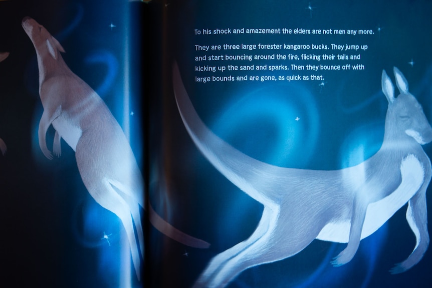 A page from children's book, illustration of ethereal kangaroos against night sky.