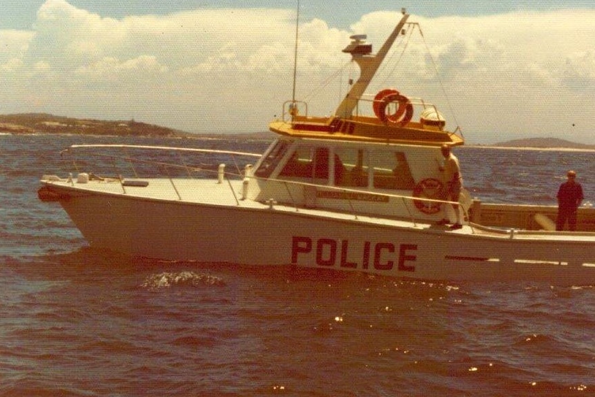 A boat with the word police on the side.