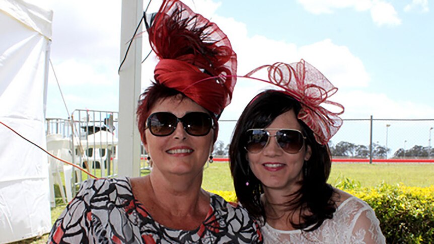 Ladies at Bundaberg Racecourse for Melbourne Cup day.