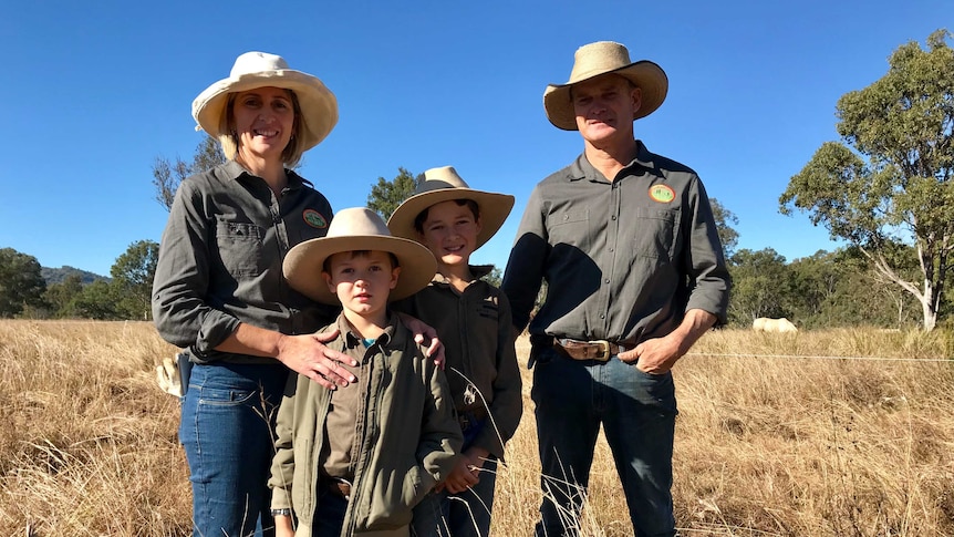 A family standing at their beef property
