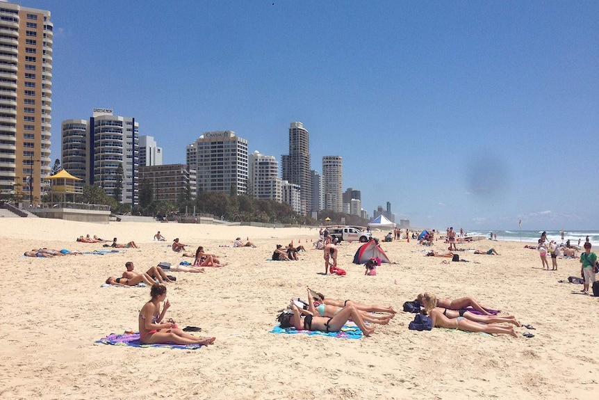 Tourists on the beach at Surfers Paradise on November 14, 2014