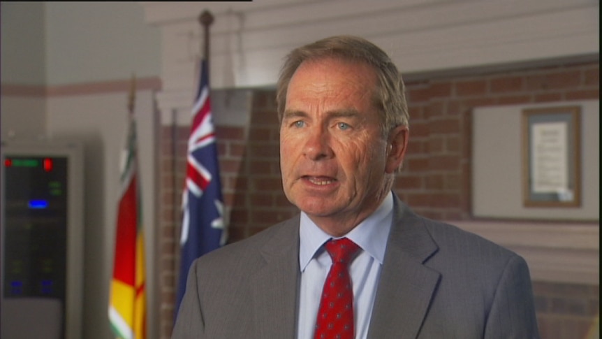 Video still: Queanbeyan Mayor Tim Overall at council chambers Dec 2012