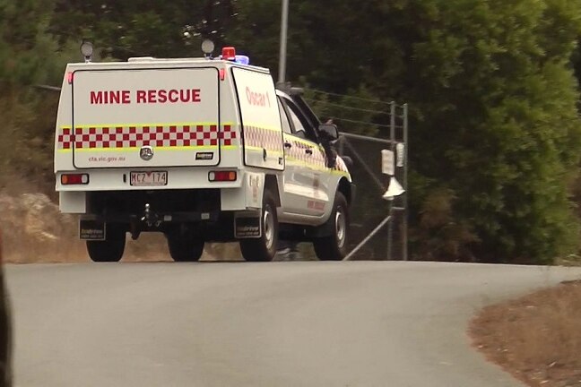 A mine rescue vehicle on a road.