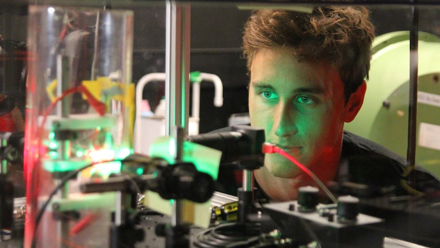Swimmer Cameron McEvoy working in a Griffith University science laboratory