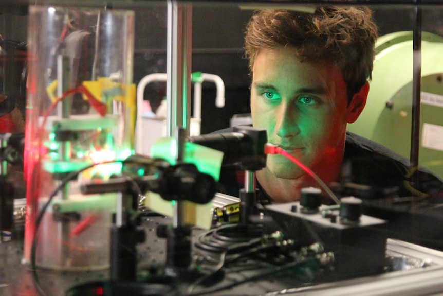 Swimmer Cameron McEvoy working in a Griffith University science laboratory