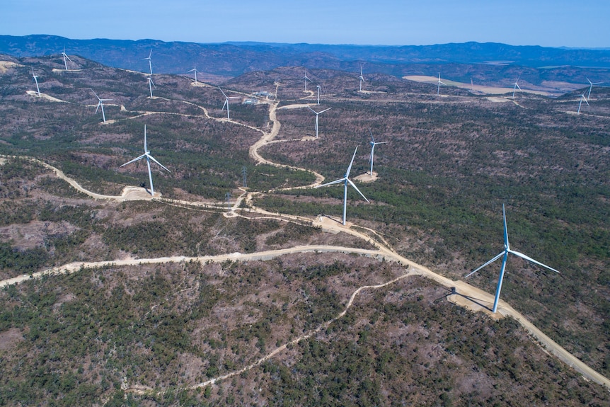An aerial shot of a large wind farm.