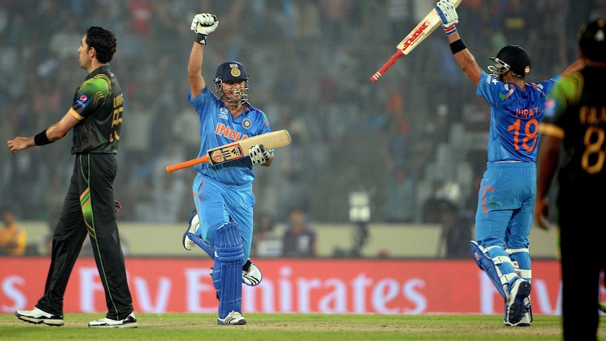 Suresh Raina (2nd L) and Virat Kohli celebrate India's win over Pakistan at the World T20.