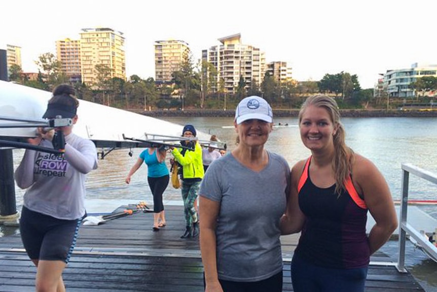 Anne Hewitt and tourist Lisanne from the Netherlands after rowing the Brisbane River.