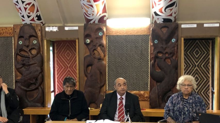 Elders and a judge sitting inside the Maori youth justice court