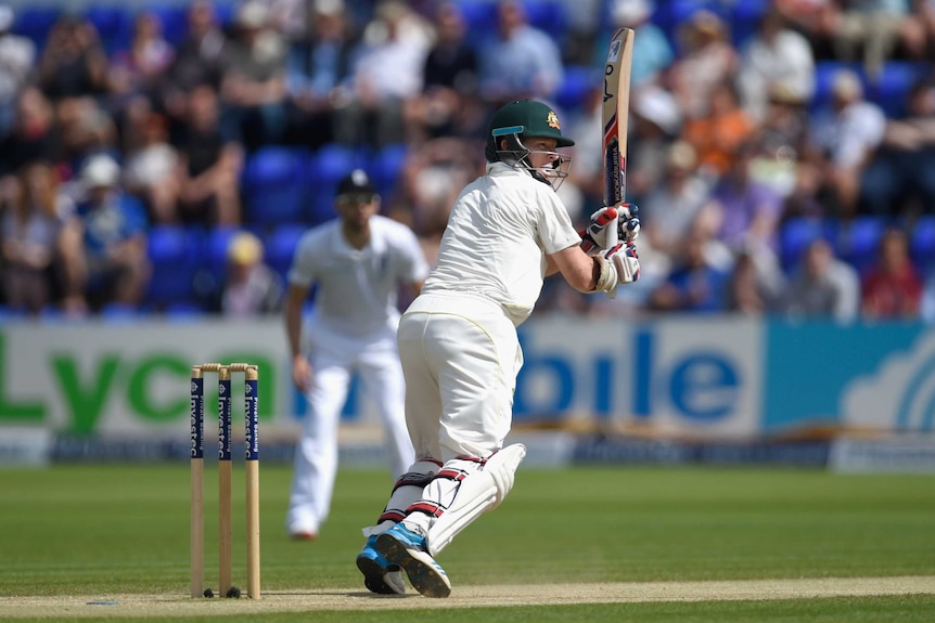 Australia batsman Chris Rogers picks up the first runs of the day