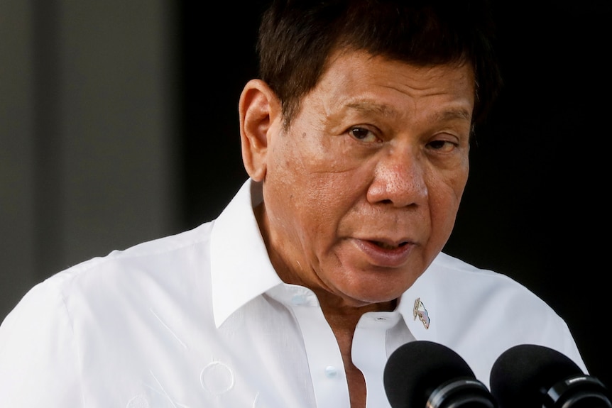 Mr Duterte gestures during a meeting on emerging infectious diseases in Manila, September 15, 2021.