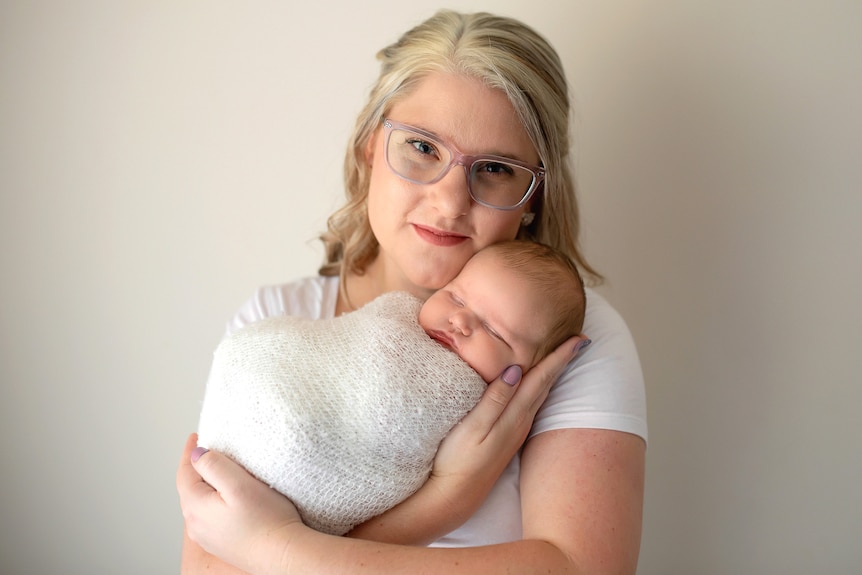 Ash Webb with her second son, born after IVF treatment