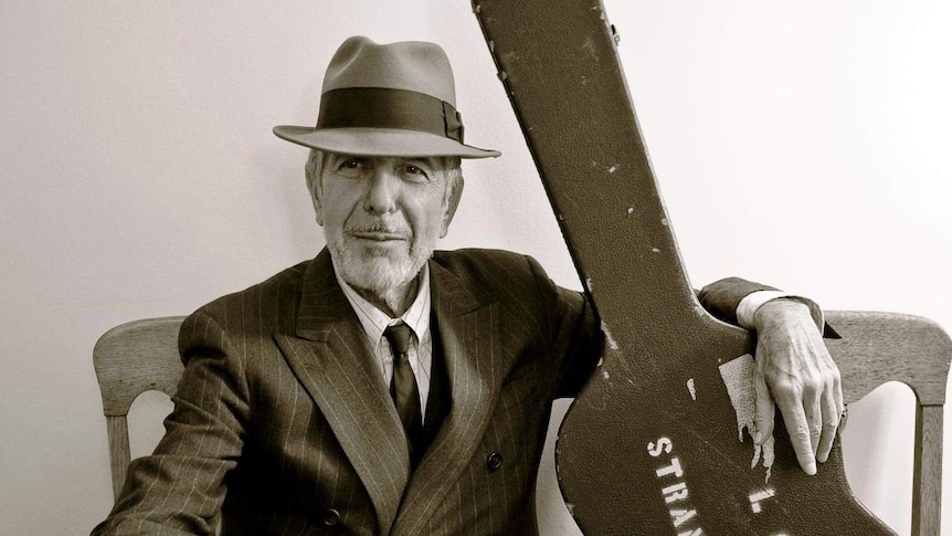 Leonard Cohen with guitar