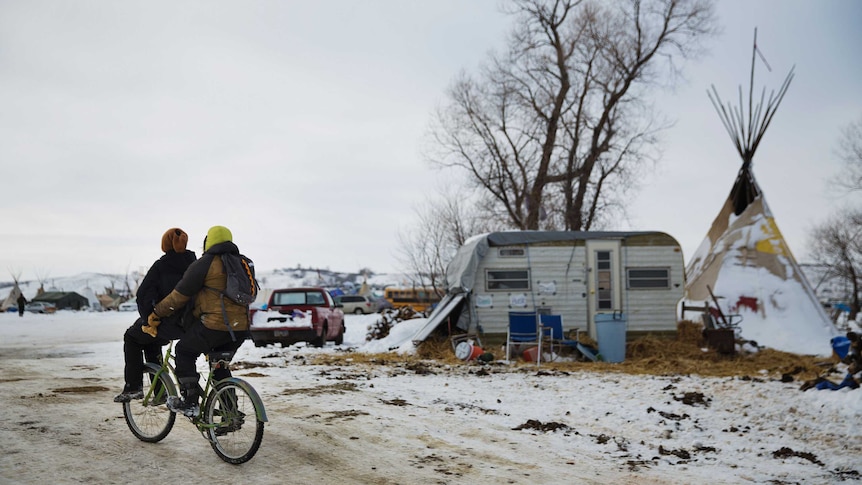 A camper and teepee at the Oceti Sakowin camp