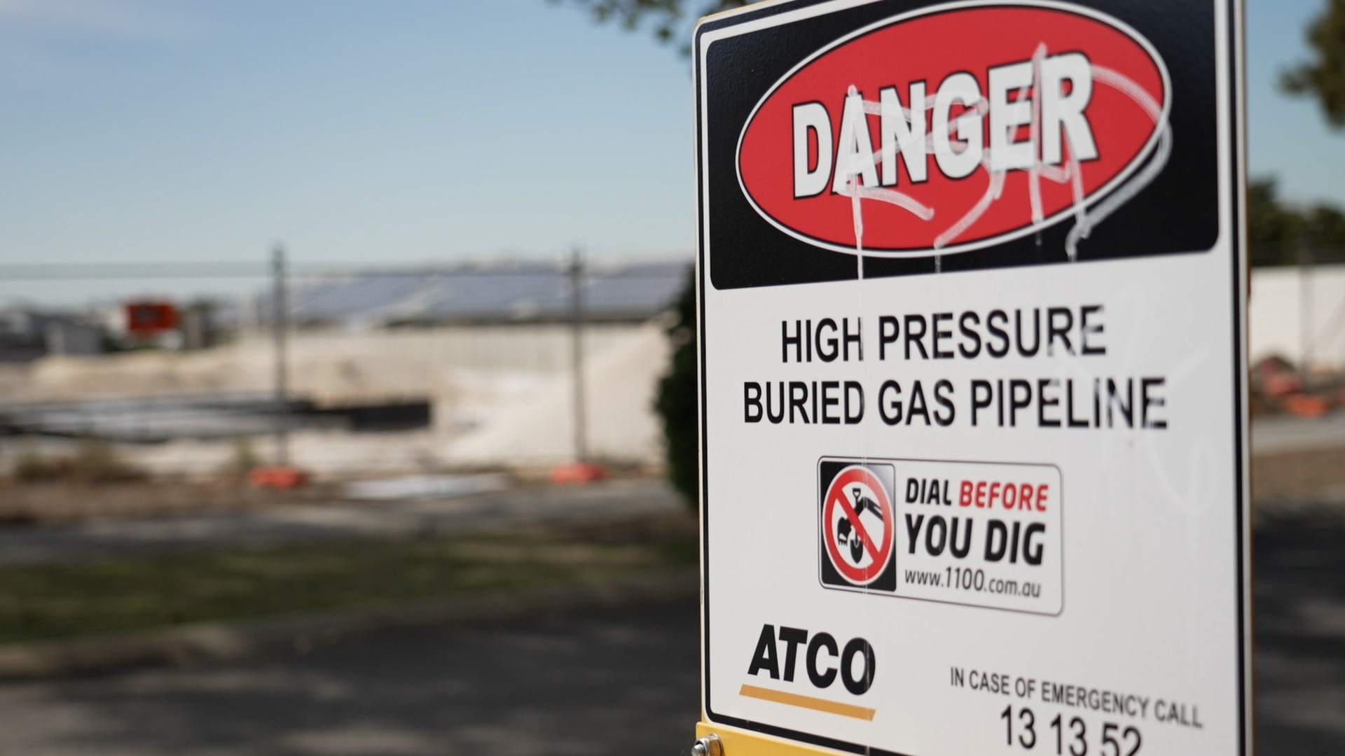 A 'danger' sign warning of a high pressure buried gas pipeline.