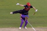 Melbourne Renegades batsman Sam Harper tumbles over Hobart Hurricanes bowler Nathan Ellis during a Big Bash League game.