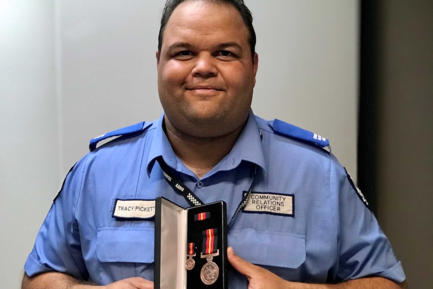 An Indigenous police officer in uniform