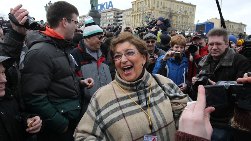 Russian independent journalist Yevgenia Albats laughs during a protest against the results of the 2012 Presidential Elections.