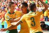 Tim Cahill celebrates at World Cup after goal