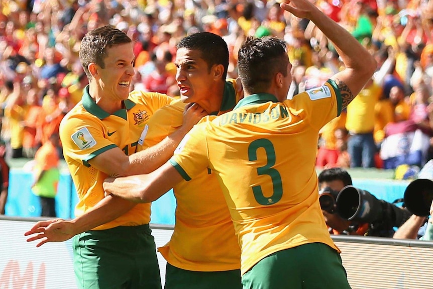 Tim Cahill celebrates at World Cup after goal