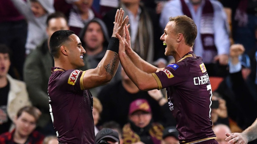 Valentine Holmes and Daly Cherry-Evans celebrate a try in State of Origin III.