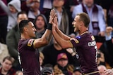 Valentine Holmes and Daly Cherry-Evans celebrate a try in State of Origin III.