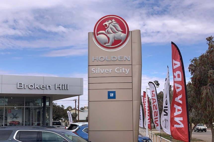 Broken Hill's Silver City Motors sign on display before its it removed permanently.