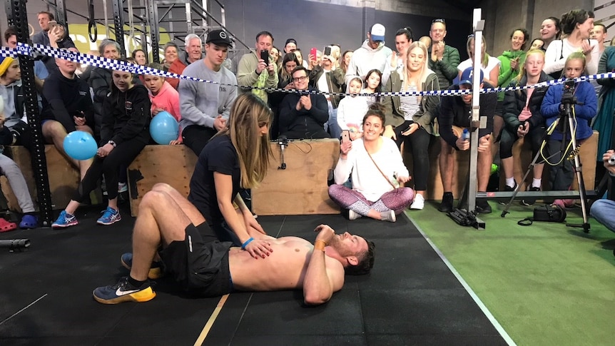 Charlie Gard with wife Liv after breaking burpee record.