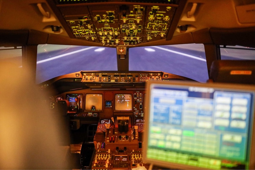 Inside an empty flight simulator.