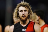 Dyson Heppell looks at the camera as he walks off the field after Essendon lost to the Western Bulldogs.