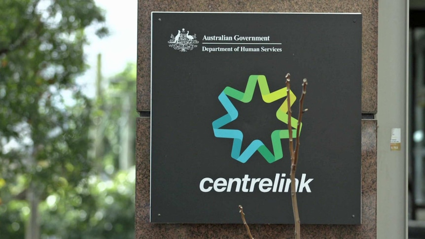 A Centrelink sign on a building.