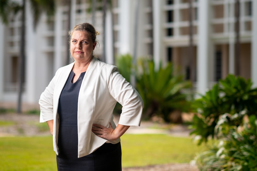 Marie-Clare Boothby, Country Liberal Party member for the Palmerston seat of Brennan, stands in front of NT Parliament.