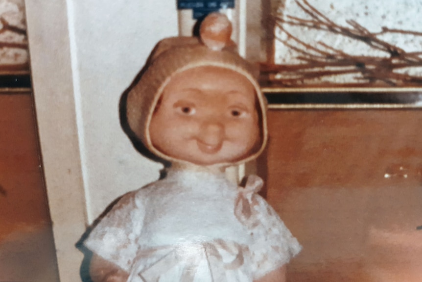 A historic photo of a doll.