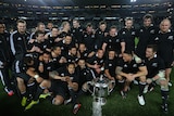 To the victor the spoils ... The All Blacks pose with the Bledisloe Cup
