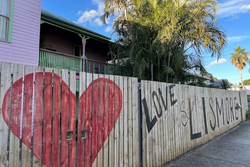 Fence in South Lismore painted with love heart and words "Love Lismore"