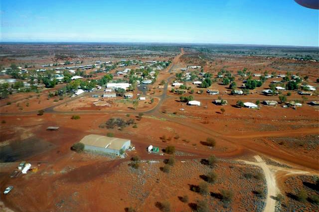 An aerial shot of a remote desert community.