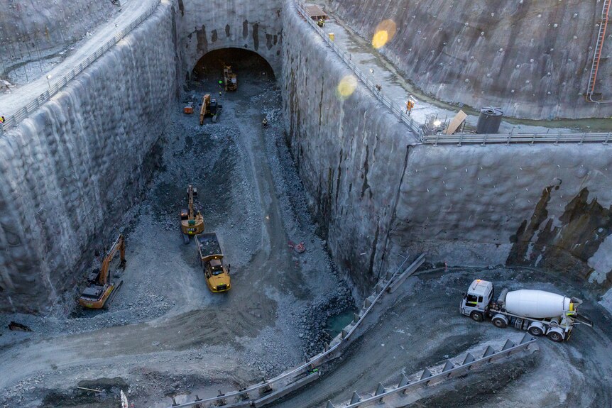 a tunnel being dug by machines