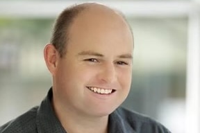 close-up photo of man smiling 